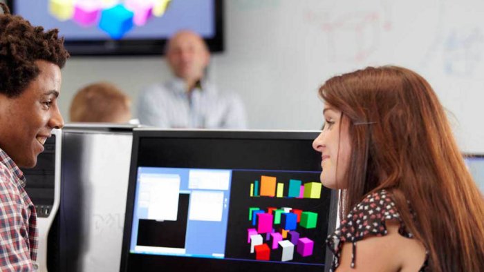 Students discussing their studies in a classroom