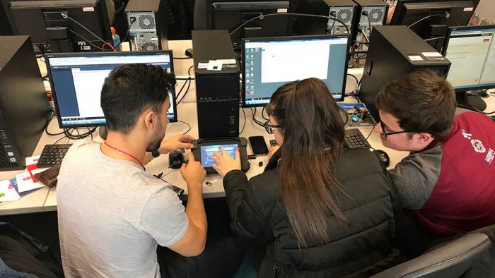 Students working with computer technologies