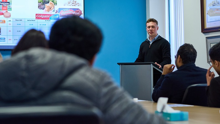 Businessman guest speaking in a University seminar class