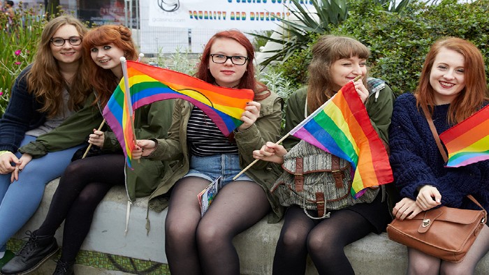 A group of people at an LGBT celebration 