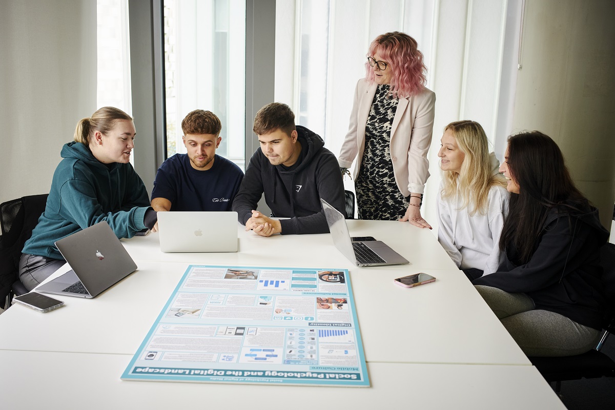 Students discussing a marketing campaign