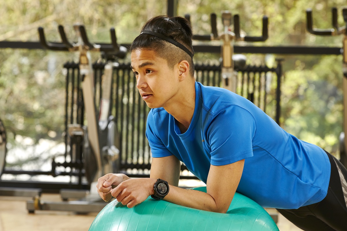 Sports student on balance ball