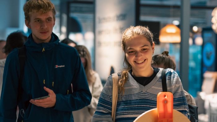 two students smiling