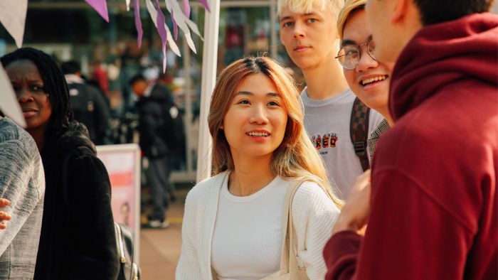 Students talking in Hallam Square