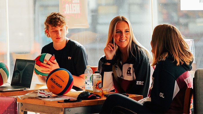 Sports students in stalls